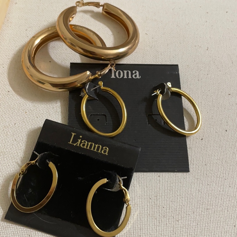 Lot of three gold hoop earrings